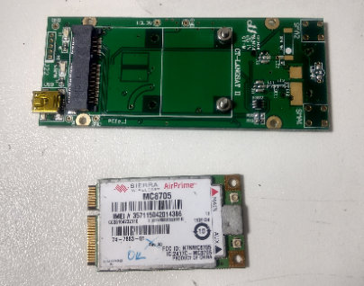 File:Green_converter_card_and_Sierra_MC8705_modem_module_next_to_it.jpg