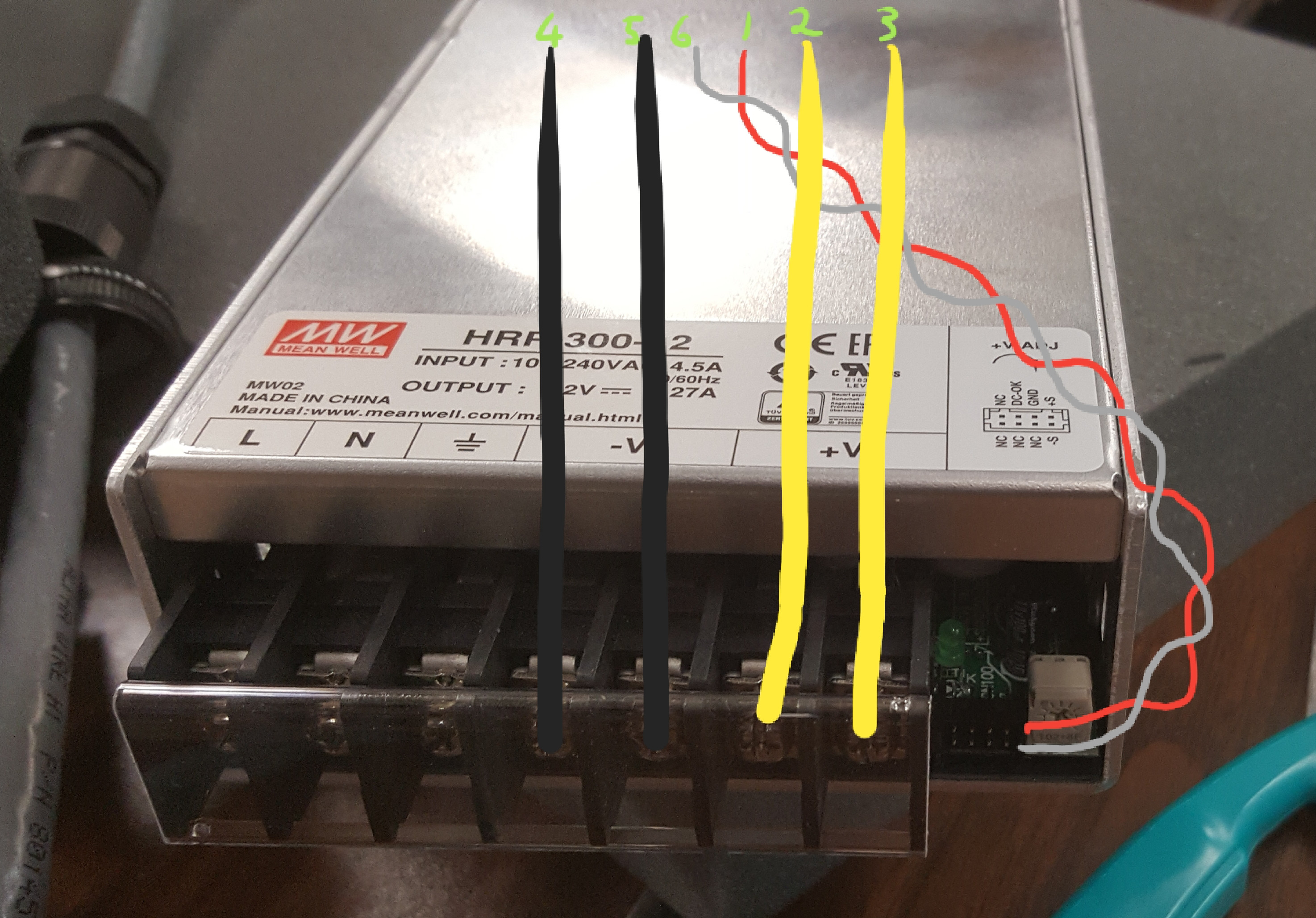 Recommended wiring on the power supply side for a 6 or 7 conductor cable (twisted pair will most likely not be present in off-the-shelf cables) You should use Blue 3mm Fork Crimps to terminate the conductors for L,N,E,-V and +V. This power supply should be installed in a metal enclosure which should be connected via grounding studs to the Earth terminal. The enclosure's door or access panel also needs to be connected. See the Meanwell HRP datasheet for sense connector details.